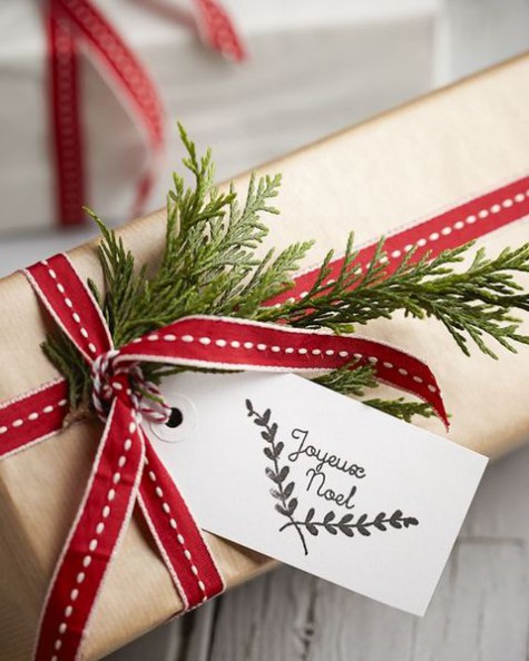 kraft paper, red and white ribbon, rosemary