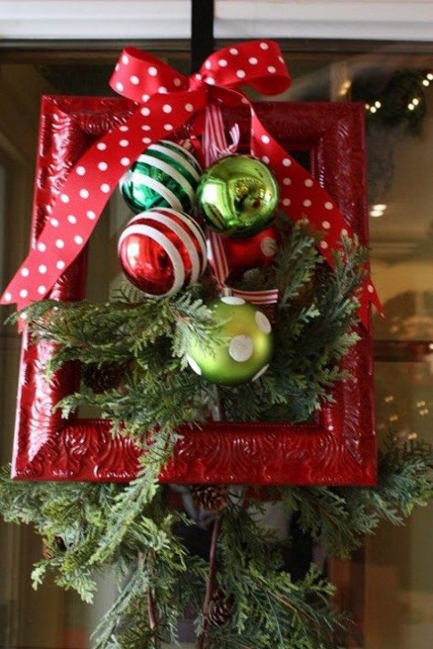 red and green ornaments in a red frame