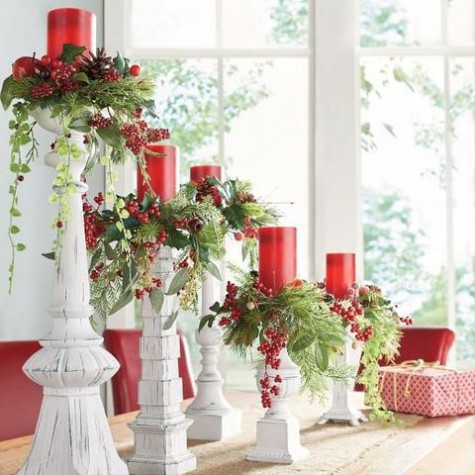 red candles. evergreens and leaves