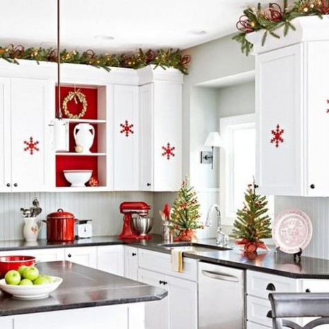 red decor and green trees and garlands for the kitchen