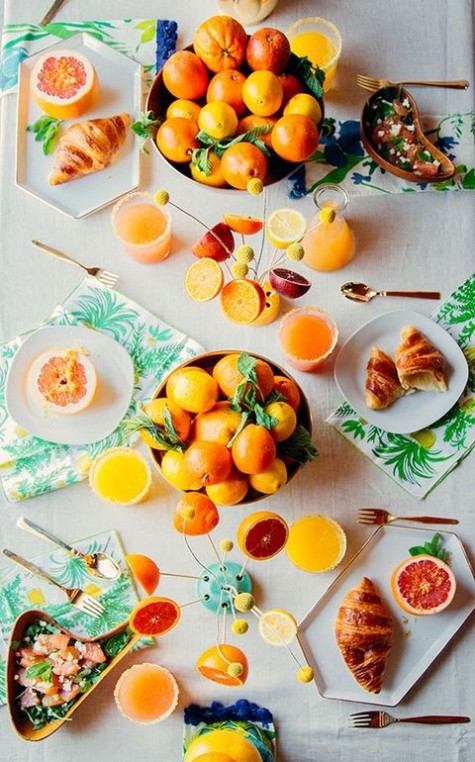 tropical print napkins, citrus and billy balls for centerpieces