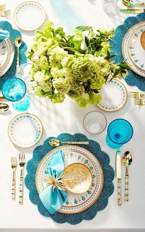 turquoise and metallic gold tablescape, green blooms and printed tableware