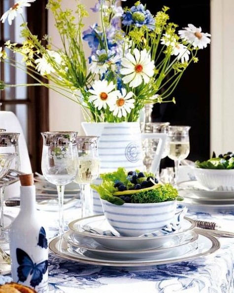 wildflowers for a centerpiece, blue printed tablecloth