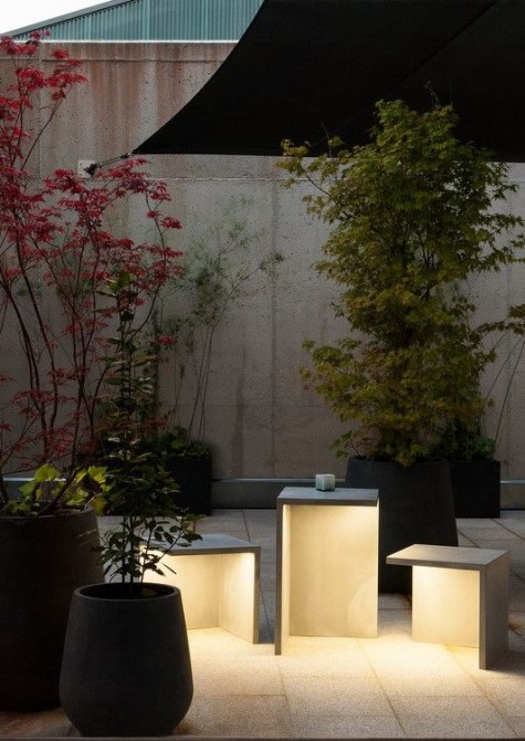 LED cement floor lamps that can be used as seats and coffee tables