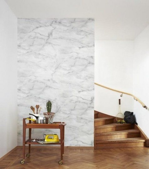 a marble statement wall will add sophistication to your entryway