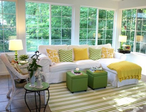 accessorize a white Ektorp sofa with colorful yellow and green pillows