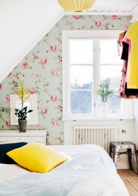 lovely pink floral wallpaper for an attic girlish bedroom