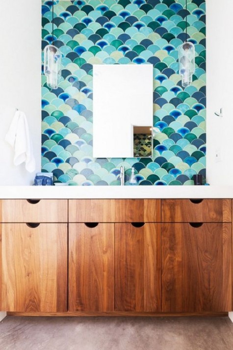 sea-inspired colorful fishscale tiles make a statement in this bathroom