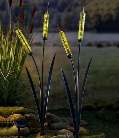 solar-powered light disguised as a sculptural cattail