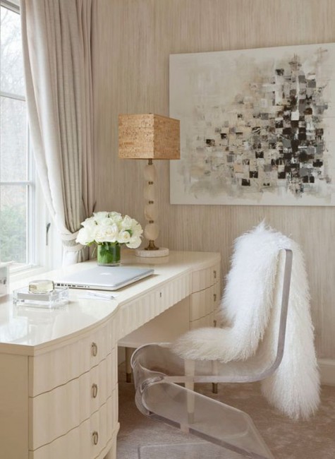 a clear acrylic chair with a faux fur cover