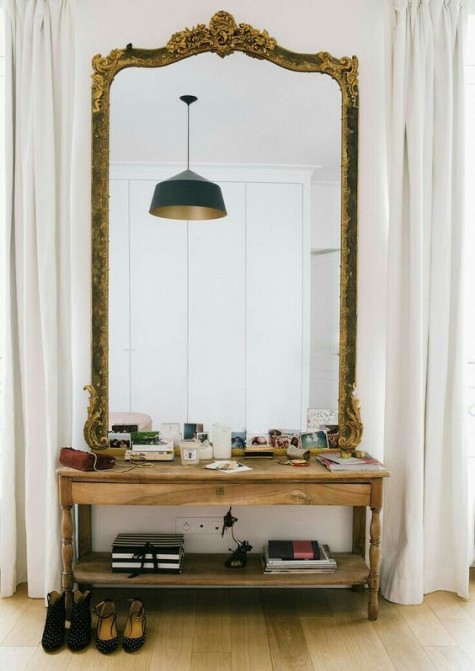a large vintage frame mirror will make your entryway chic