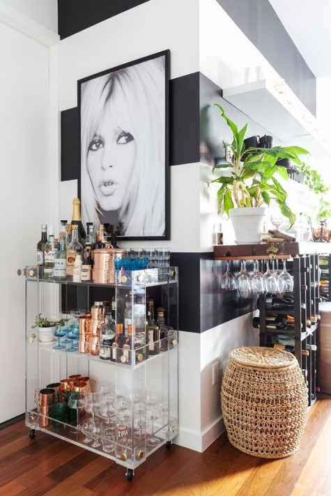 a lucite bar cart with several layers
