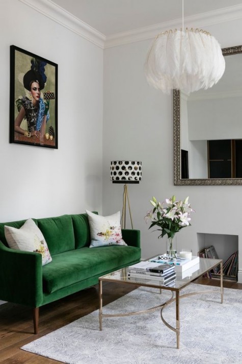 a modern emerald velvet sofa makes a colorful statement