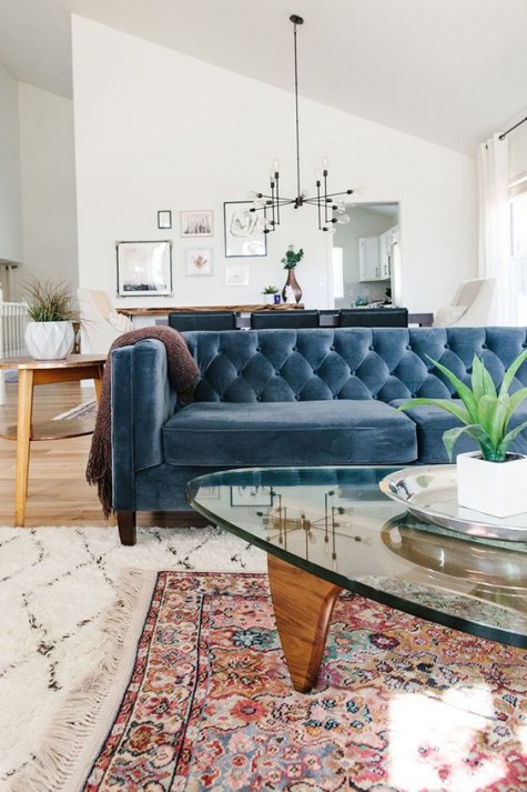 a navy diamond upholstery velvet sofa looks nice
