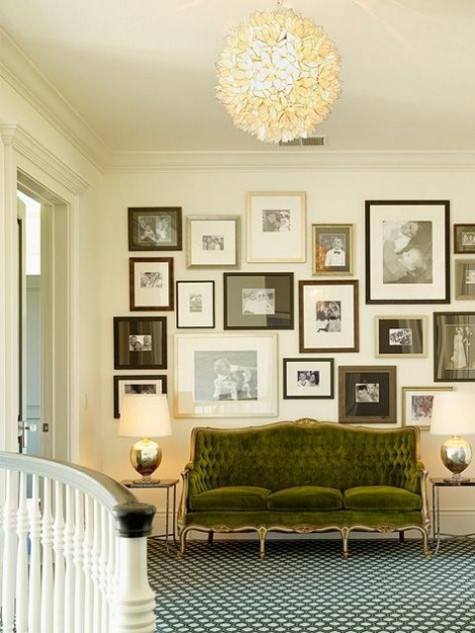 a refined green velvet sofa with gilded framing and diamond upholstery