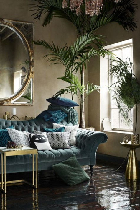 a sky blue velvet sofa with diamond upholstery looks refined