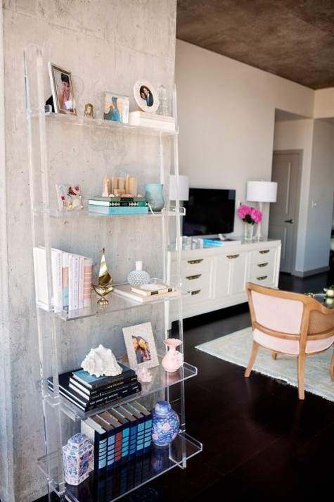 an acrylic shelving unit doesn\'t look bulky and accomodates many things