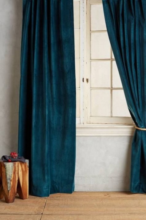 bold teal velvet curtains will make the space amazing