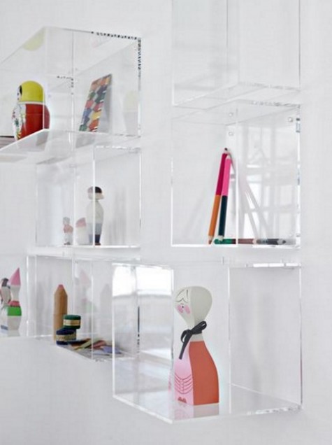 clear acrylic box shelves on the wall look very airy
