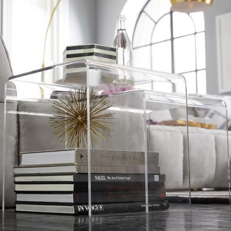 clear acrylic trunks for storage and as side tables
