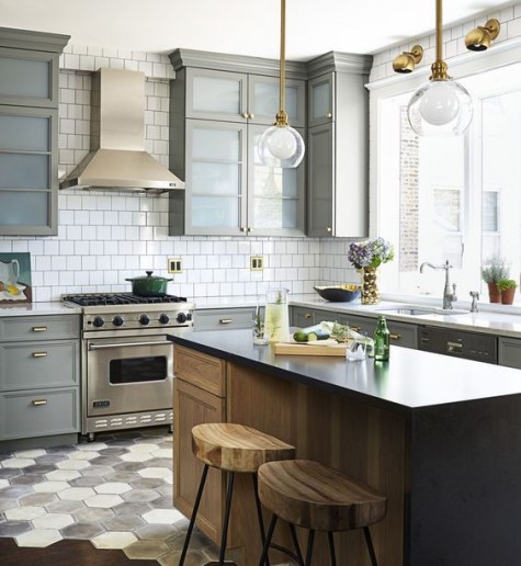 marbelized hex tiles in the kitchen coming into dark stained wood floors