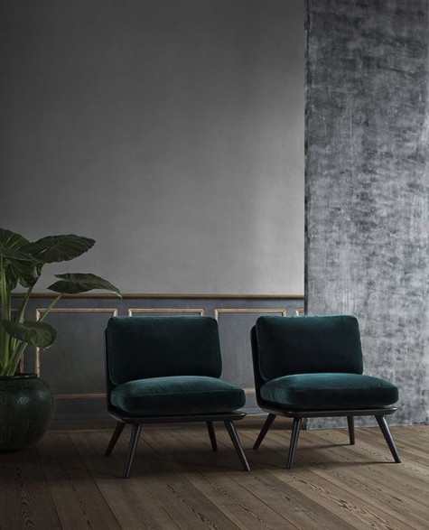 modern black framing chairs with emerald velvet upholstery