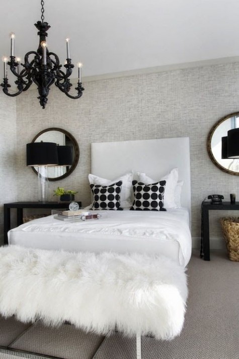 a faux fur bench at the foot of the bed will add a refined feel