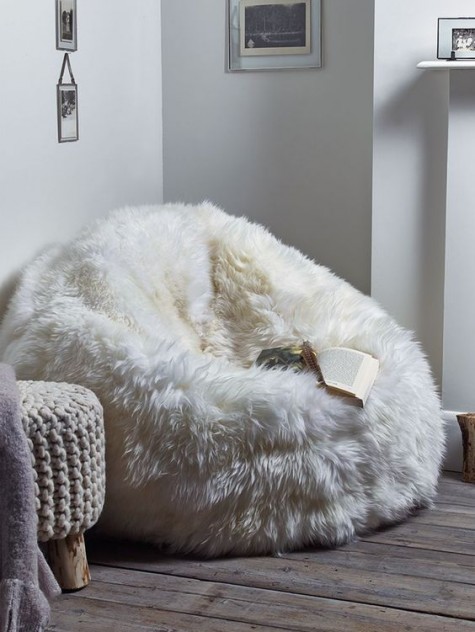 a white faux fur bean bag will embrace you after a hard day