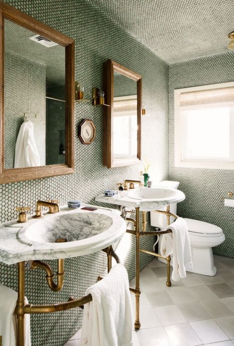 grey marble penny tiles with black grout look bold and chic