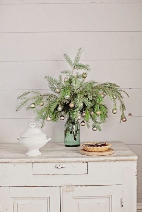 branches with metallic ornaments for Christmas