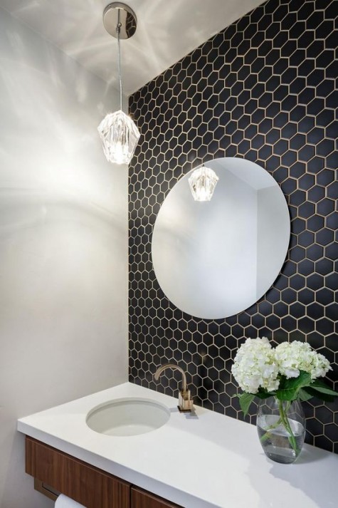 small black hex tiles with copper grout look elegant
