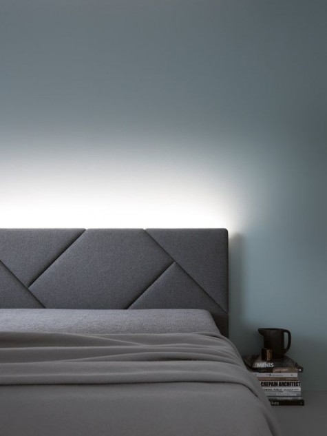 a modern geometric upholstery headboard as a decor element