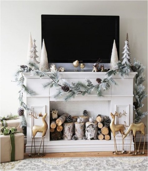 christmas trees, animal figurines and a snowy garland with pinecones