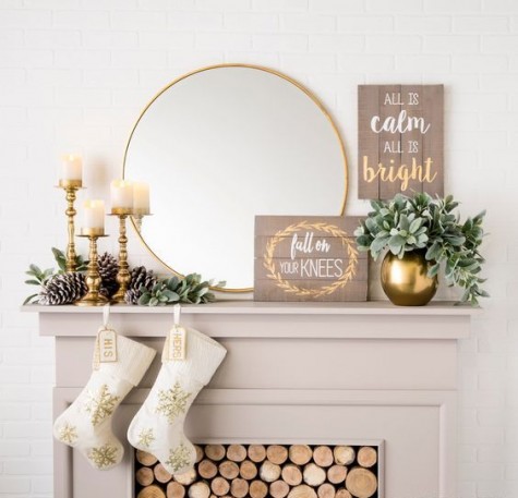 snowy pinecones, little pallet signs, greenery and candles