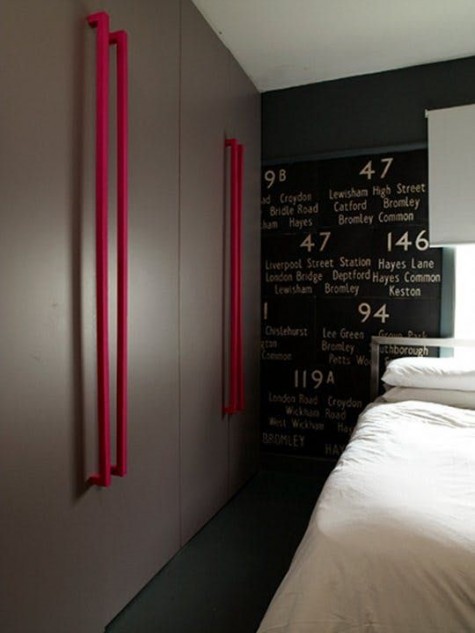 Pax hacked with dark stained doors with large red handles for a statement