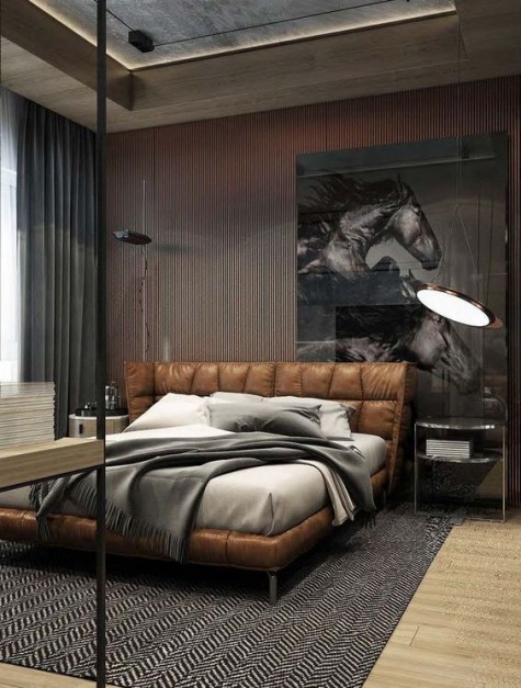 a brown padded leather upholstered bed