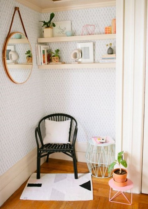 a cozy sitting nook with mid-century modern furniture and some shelves