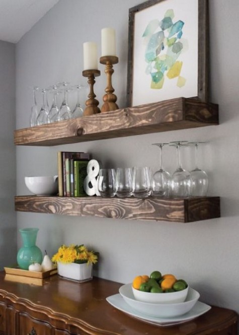 a home bar space with thick wooden shelves