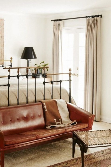 a rich brown leather sofa instead of a usual bench