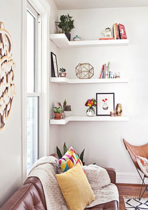 corner floating shelves is a great idea for an awkward corner
