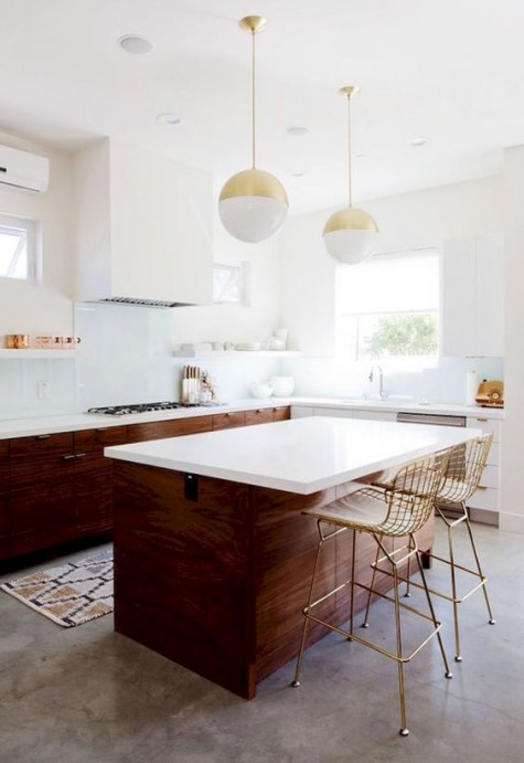 dark-stained wood and white cabinets plus metallic touches for a mid-century modern space