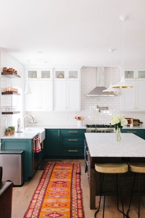 emerald and white cabinets, subway tiles for the backsplash and some metallic touches here and there