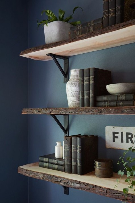 floating shelves with a live edge add a masculine feel to your space