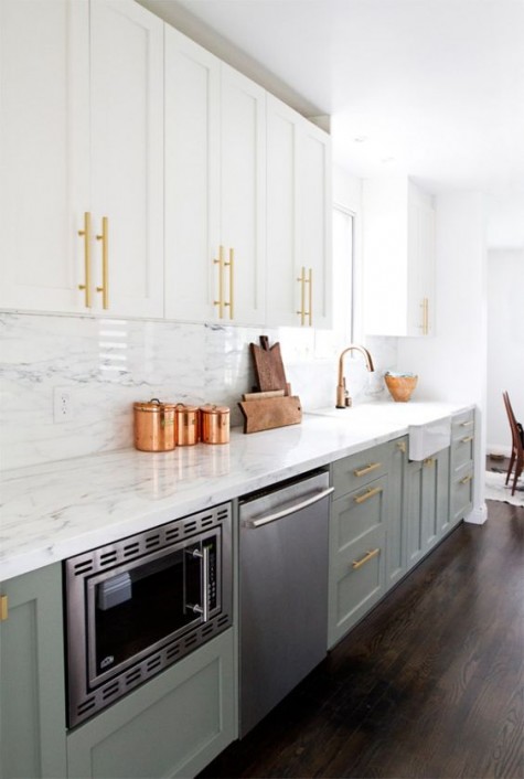 light grey and white kitchen cabinets with brass and copper touches for a chic feel