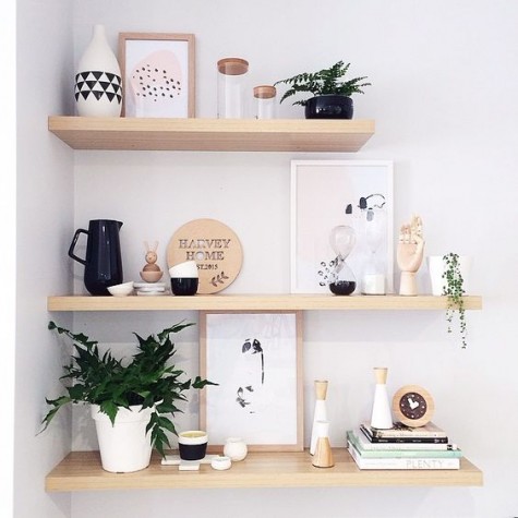 modern floating shelves of light-colored plywood for a stylish display