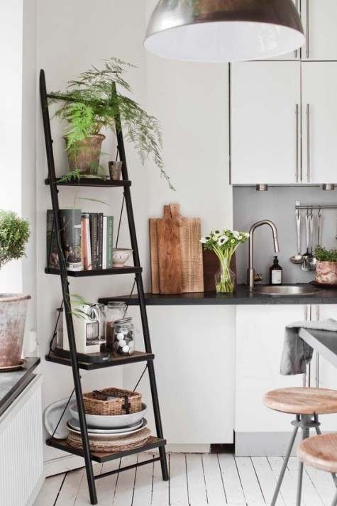 place a comfy staircase for storage in the kitchen to save some space