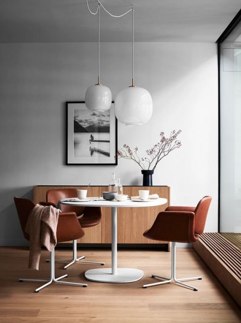 rich brown leather chairs for the dining space