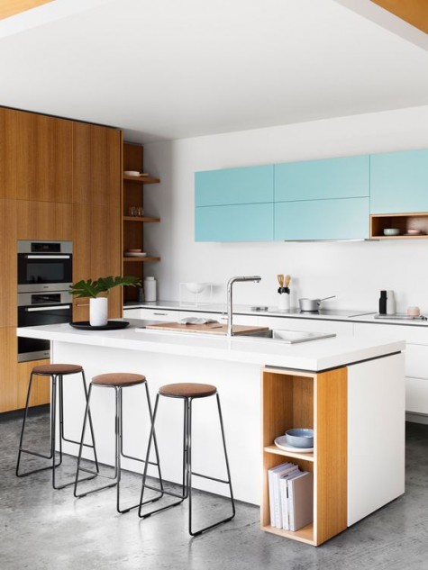 white and light blue cabinets plus much light-colored wood for a fresh modenr look