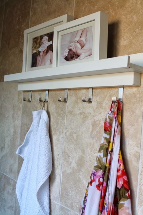 IKEA Ribba ledges plus hooks for hanging towels