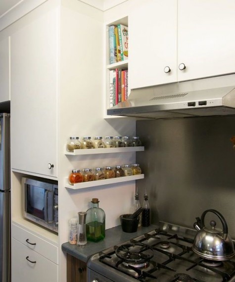 IKEA Ribba ledges with spice jars by the cooking zone